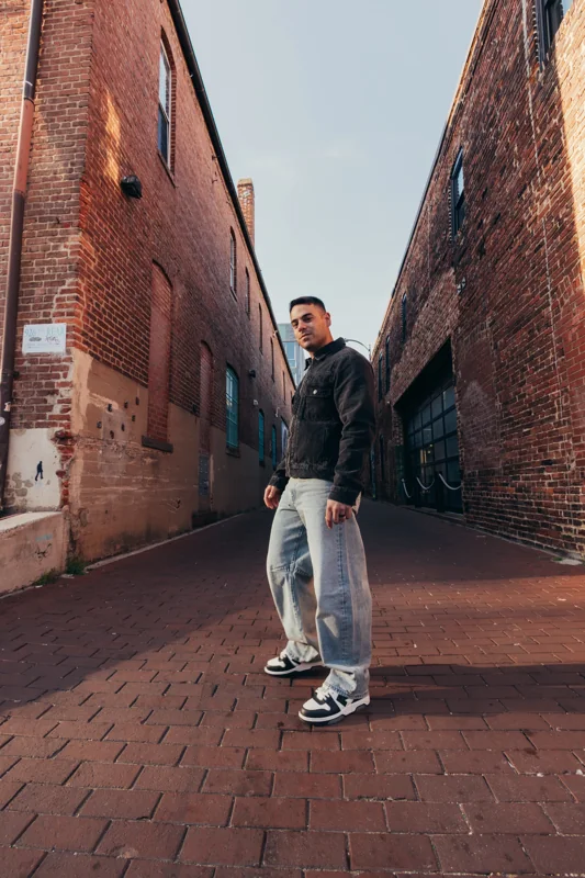 Andrew Weiss in an urban alley